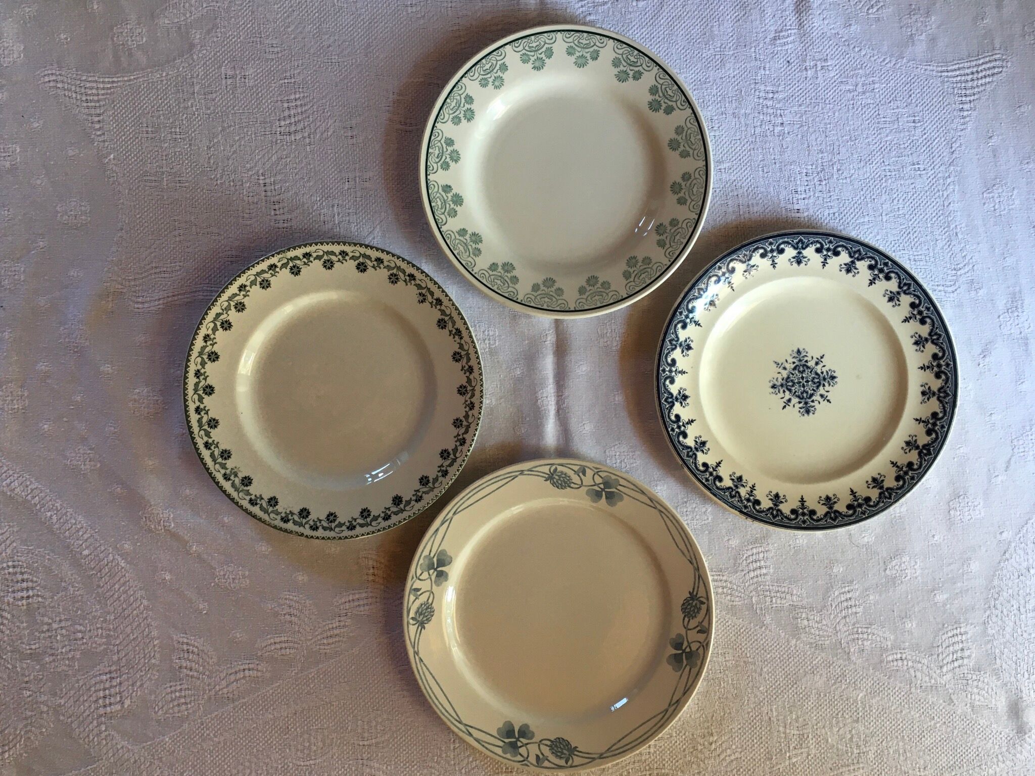 Set of 4 old plates with blue-green décor