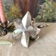 Pair of silver metal flower candle holders