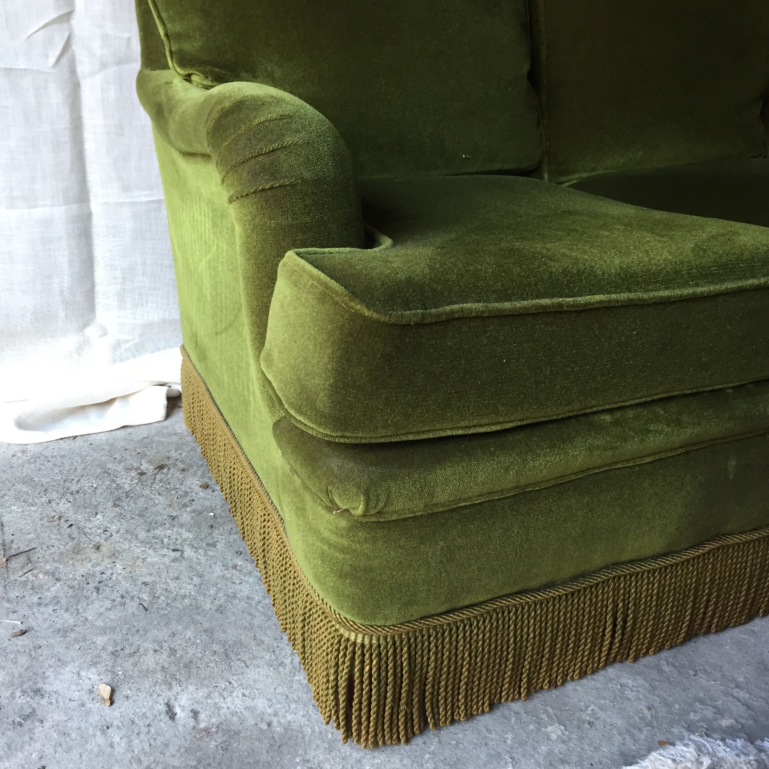 Vintage green velvet sofa