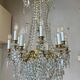 golden bronze chandelier in Louis XVI style
