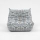 Togo lounge chair and pouf in patterned fabric by Michel Ducaroy for Ligne Roset, 1973, set of 2