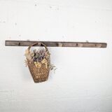 Handcrafted wall coat rack in raw wood