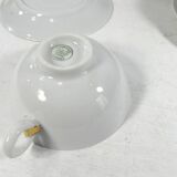 White porcelain and mint cups and saucers, half a cup