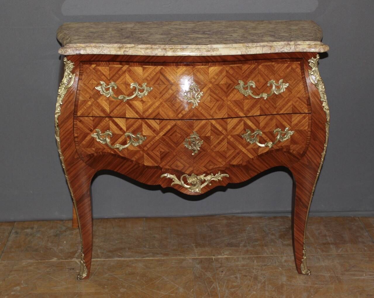 Louis XV commode in marquetry