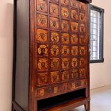 Apothecary cabinet with 38 drawers made of elm wood.