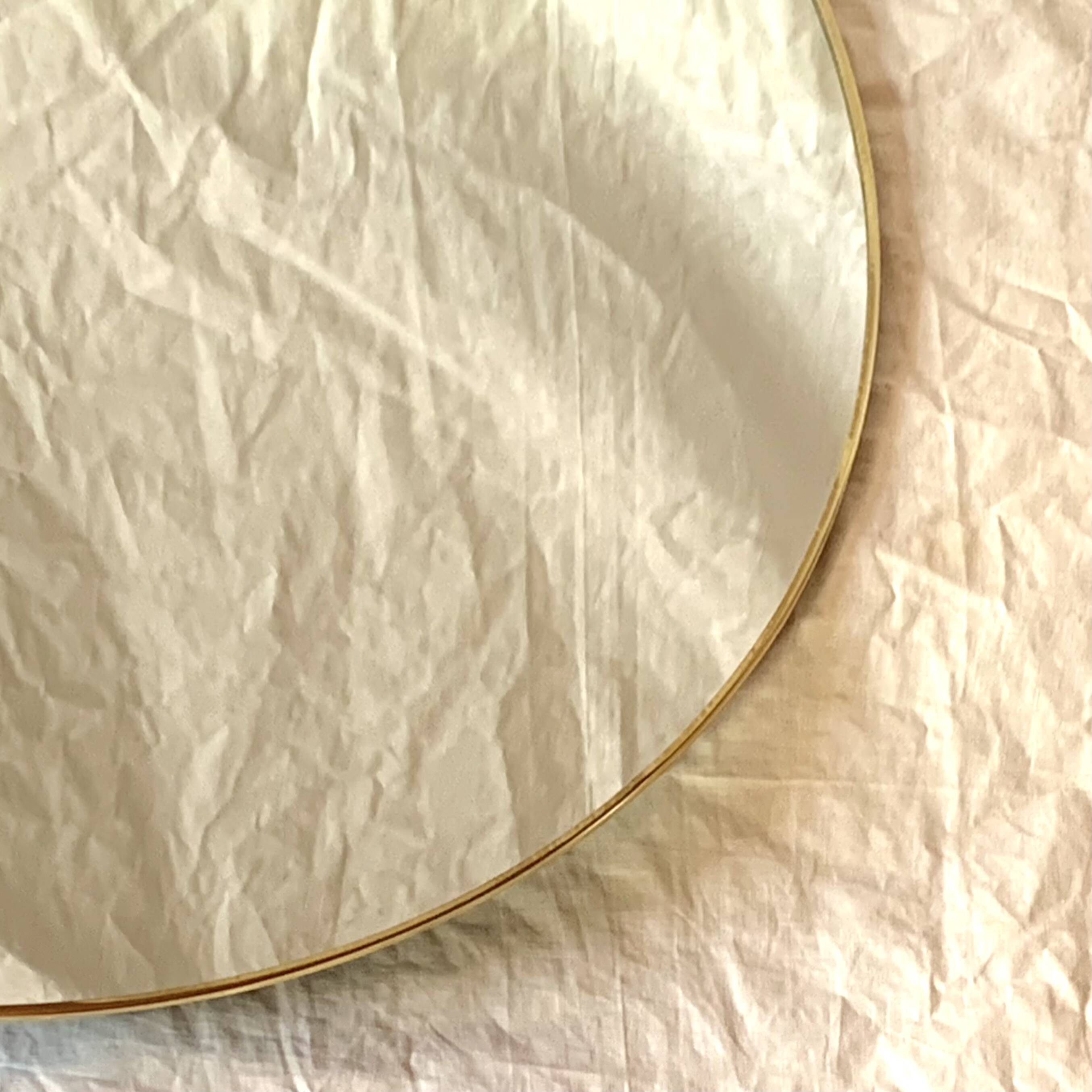 Round mirror with brass rim - 55 cm
