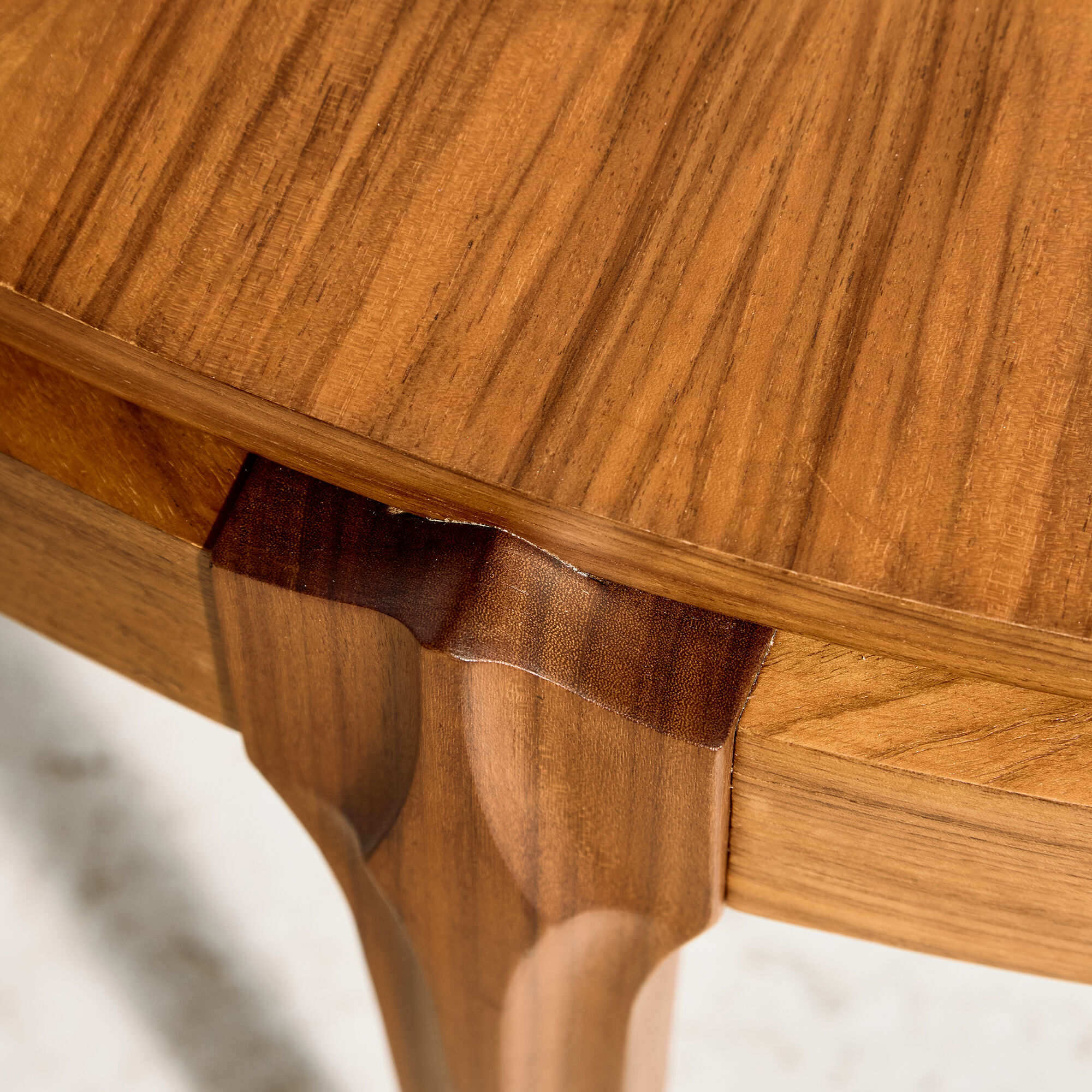 Coffee table in walnut with a ceramic top.