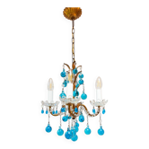 Italian chandelier in gilded metal with turquoise blue Murano crystal drops.
