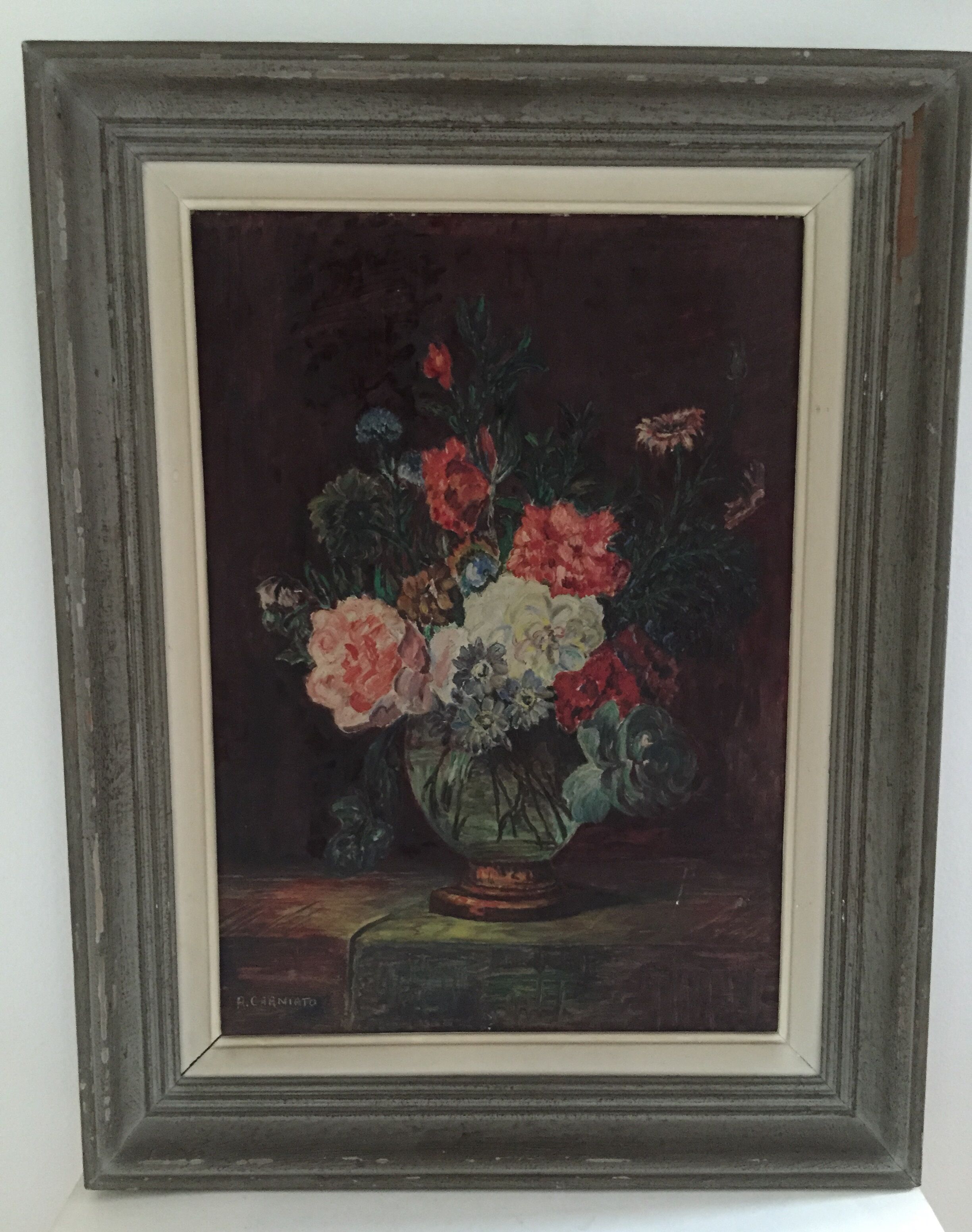 Oil on panel: still life with a bouquet of flowers on a bed