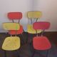Set of 4 yellow and red formica chairs