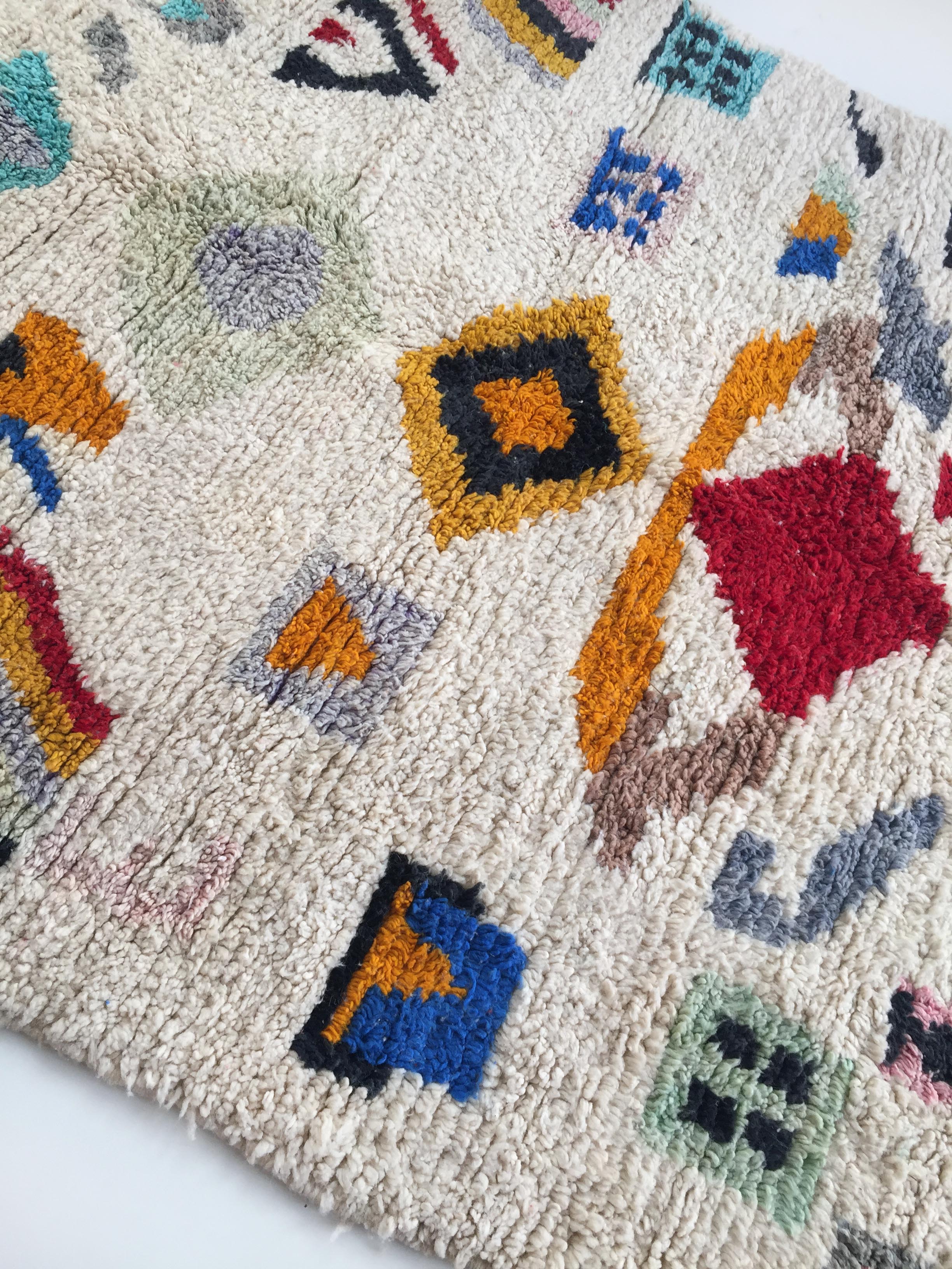 Moroccan Berber carpet Boujaad ecru with colorful patterns 263x185cm