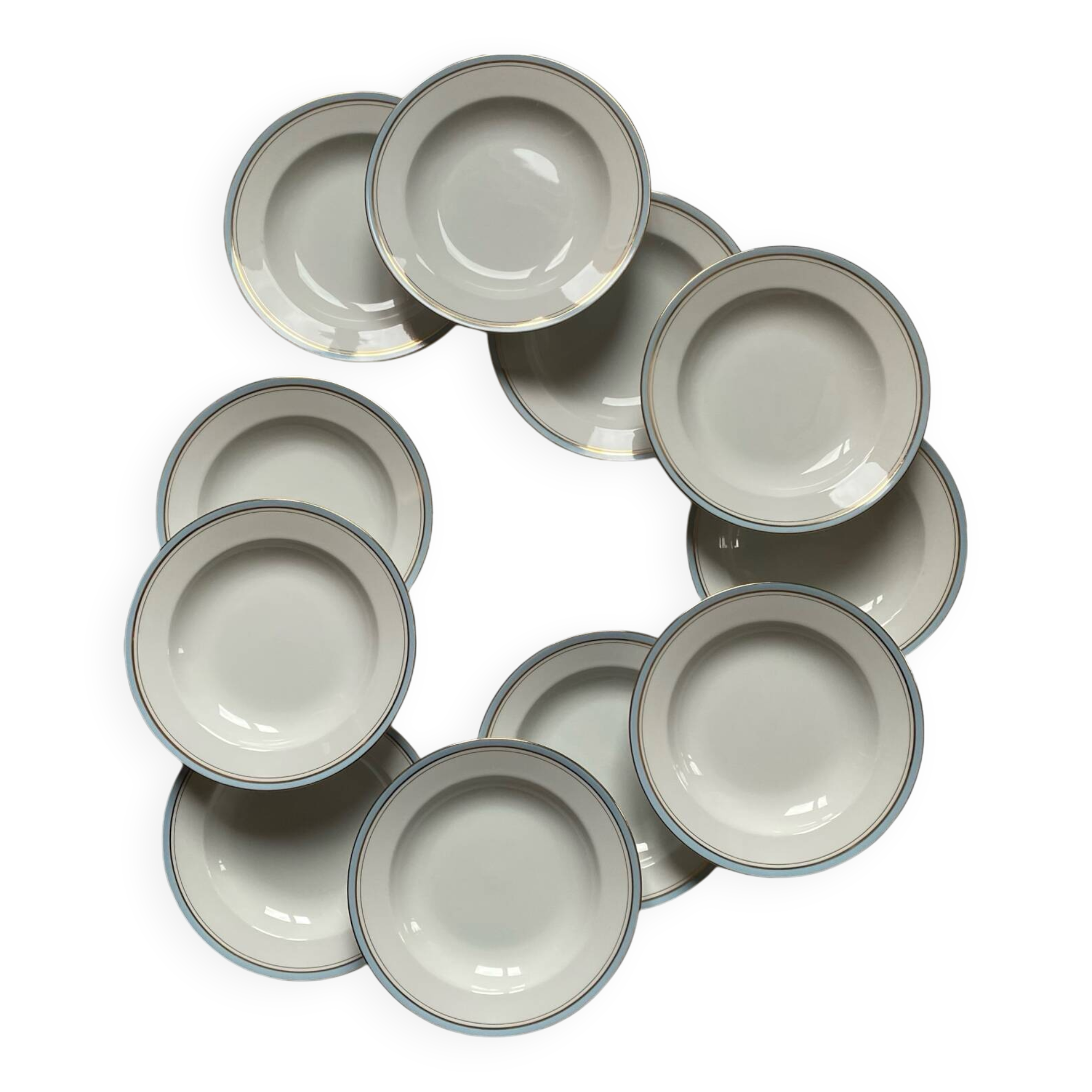 11 antique porcelain soup plates from the Couleuvre factory