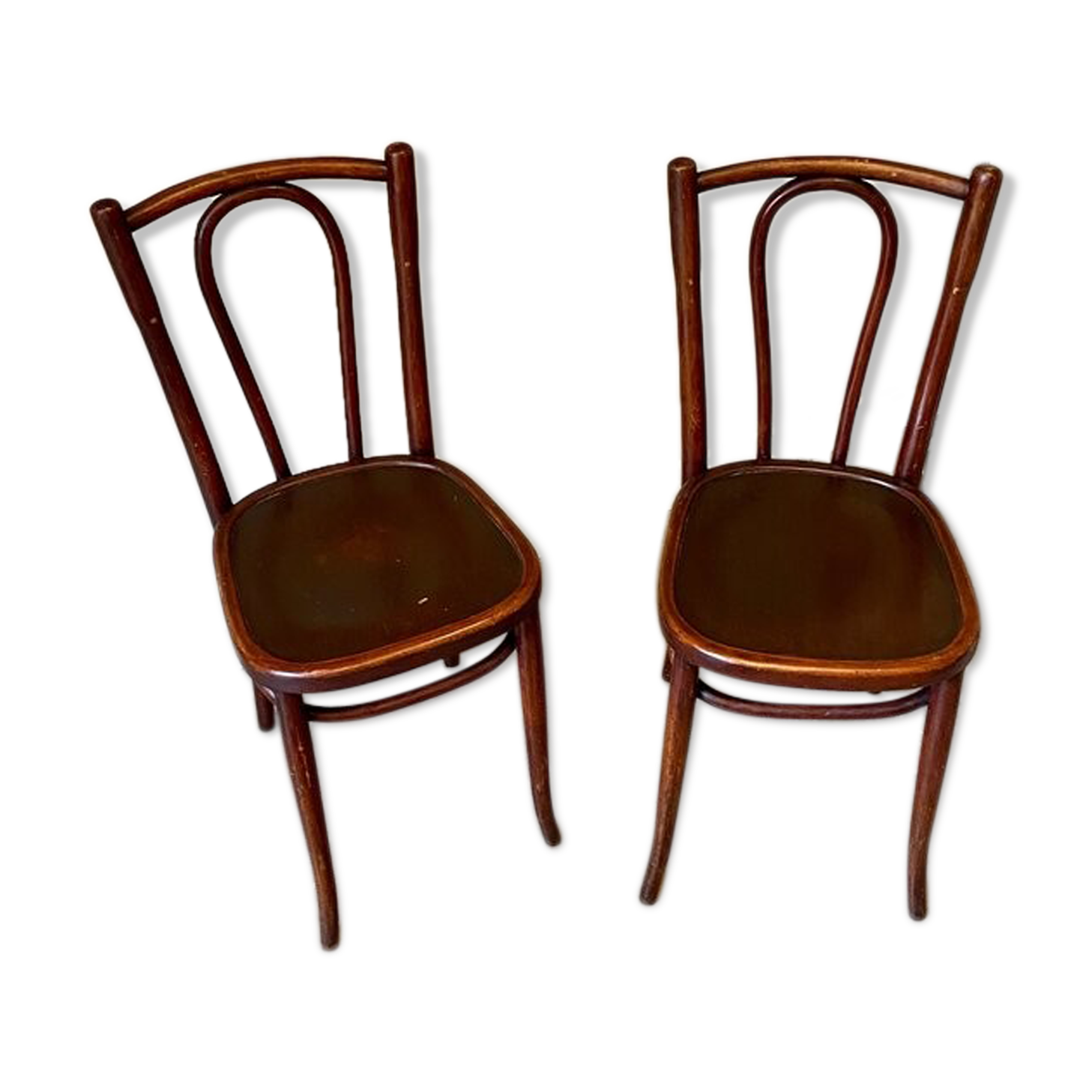 2 bistro chairs in arched and dark wood