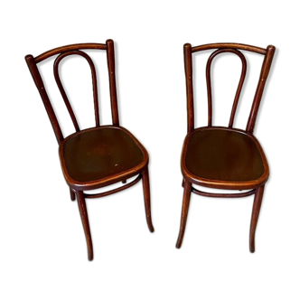 2 bistro chairs in arched and dark wood