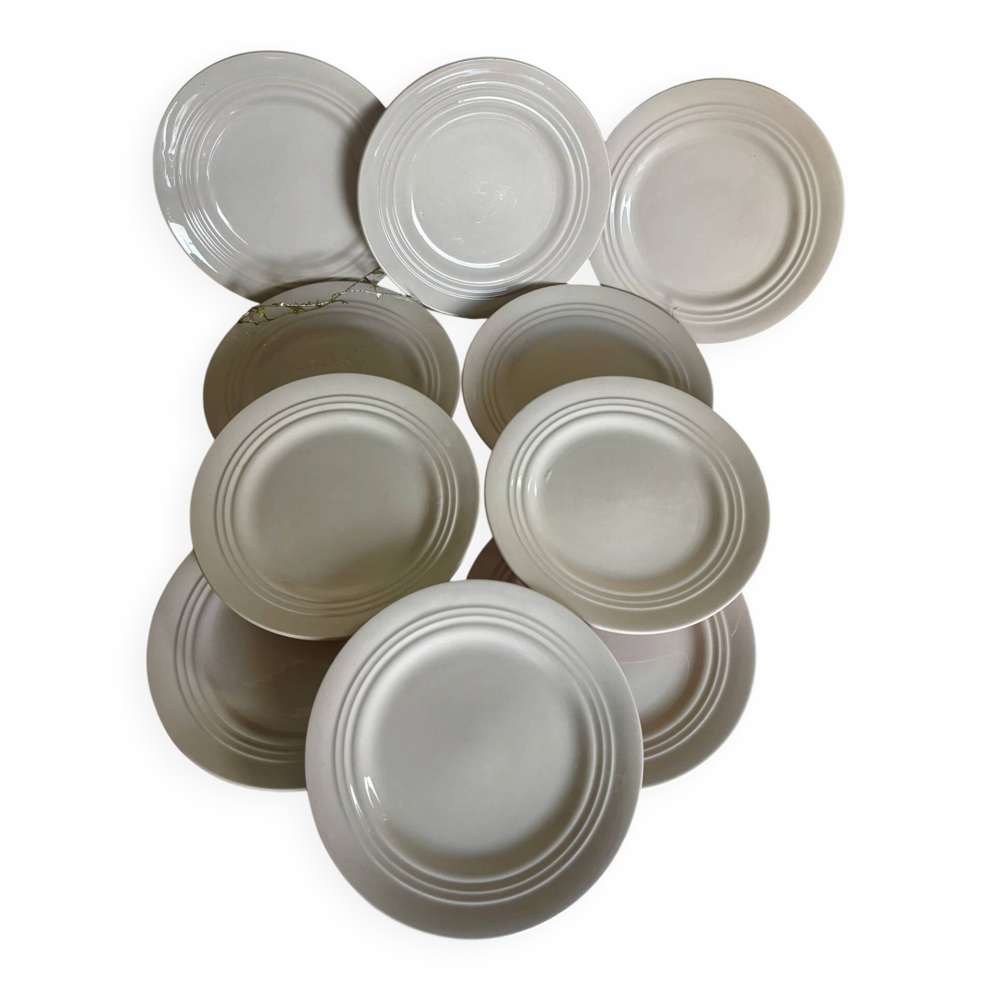 Ensemble de 10 assiettes à dessert anciennes en faïence rose pâle