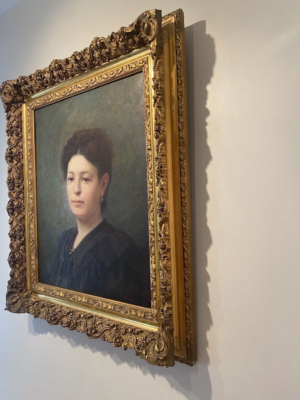 Portrait of a young woman, signed H Mouthier (1880-1975) and dated 1907