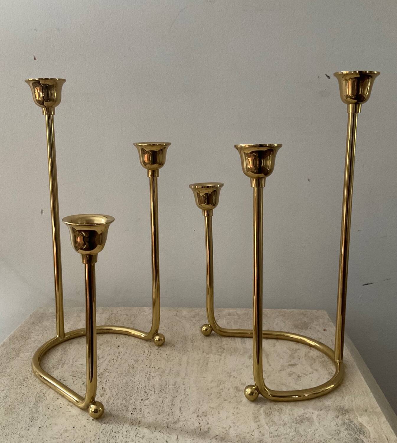 Duo of modernist brass candlesticks