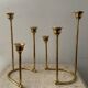 Duo of modernist brass candlesticks