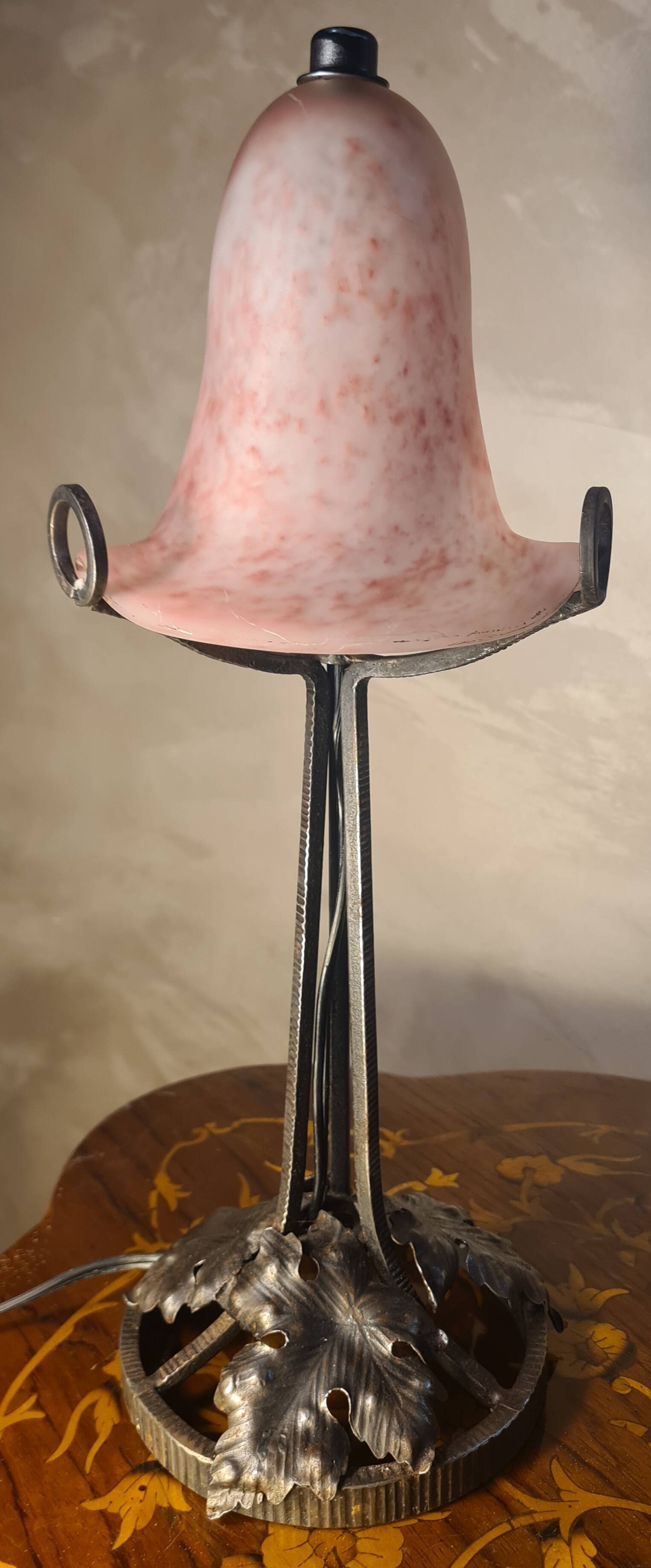 Antique wrought iron floor lamp, 1900, with a glass shade, 40x15.