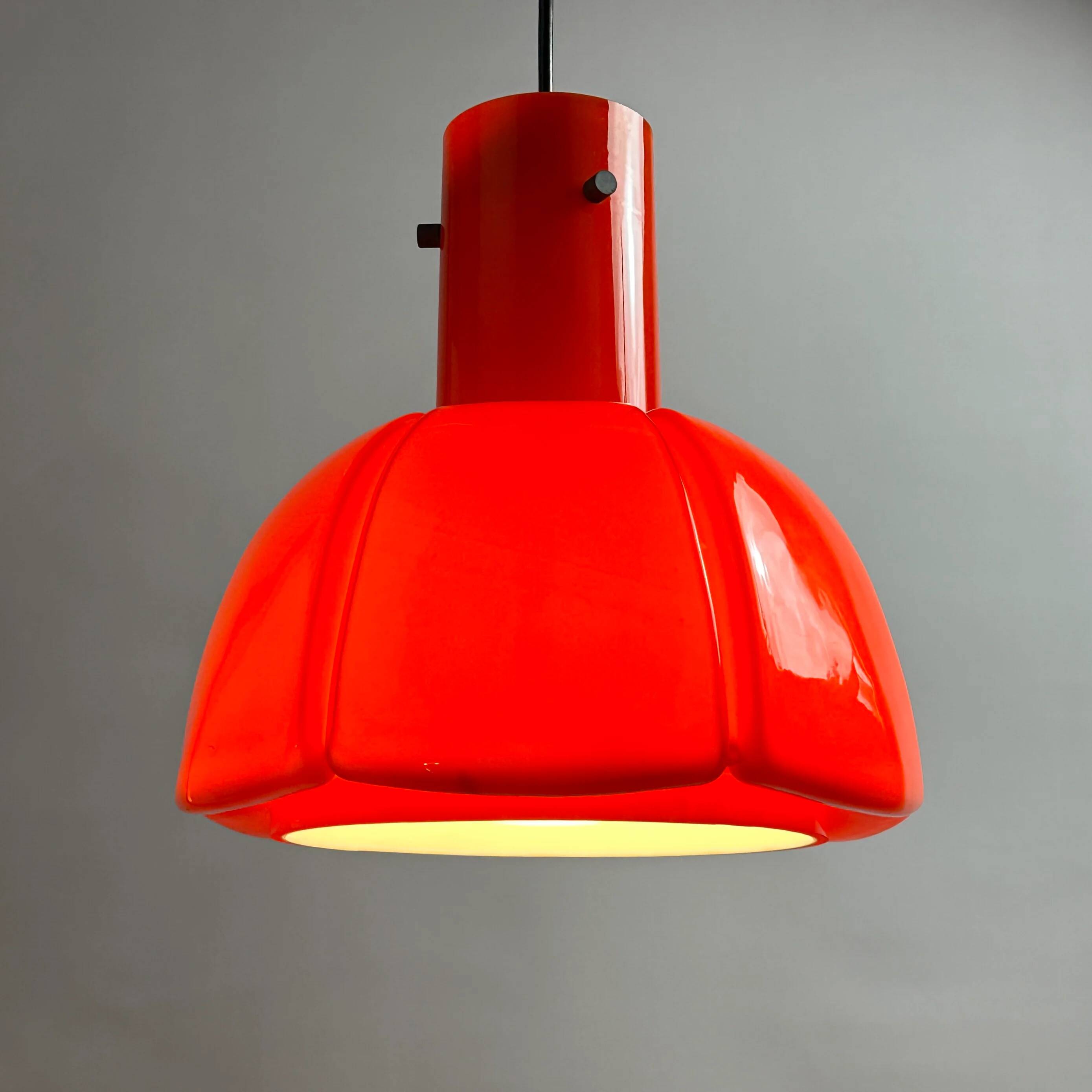 Red glass flower-shaped pendant by Glashütte Limburg.