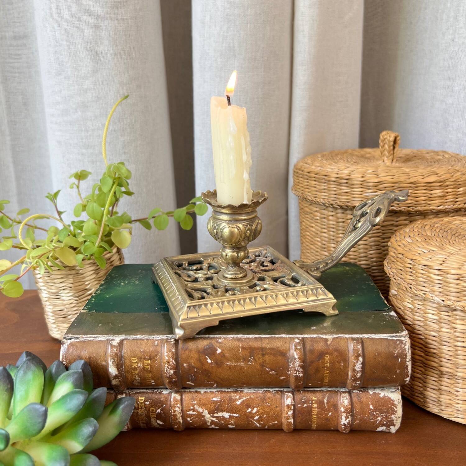 Bronze cellar rat candle holder