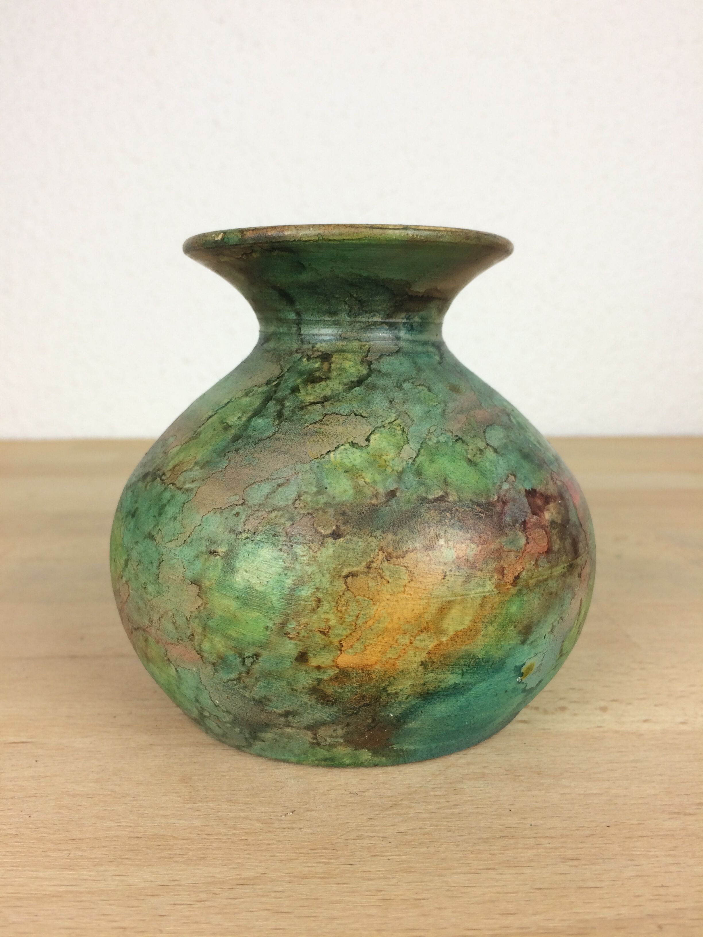 Vintage green ceramic ball vase