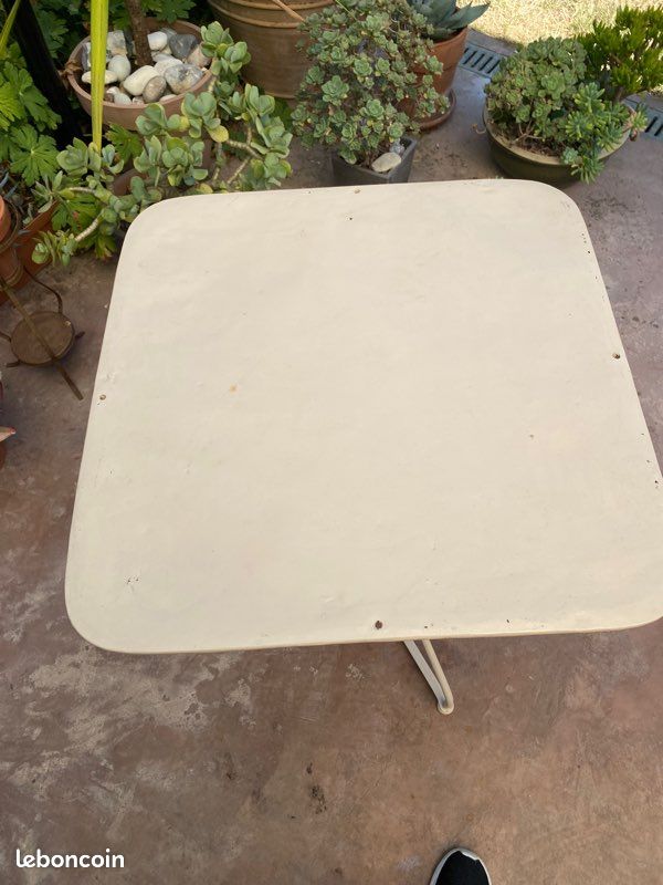 Wrought iron pedestal table