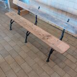 Antique garden bench with cast iron legs