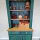 Rustic dresser with floral decor
