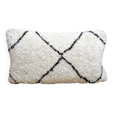 Bohemian wool pillow cover on a Beni Ourain Berber cushion. The cushion cover