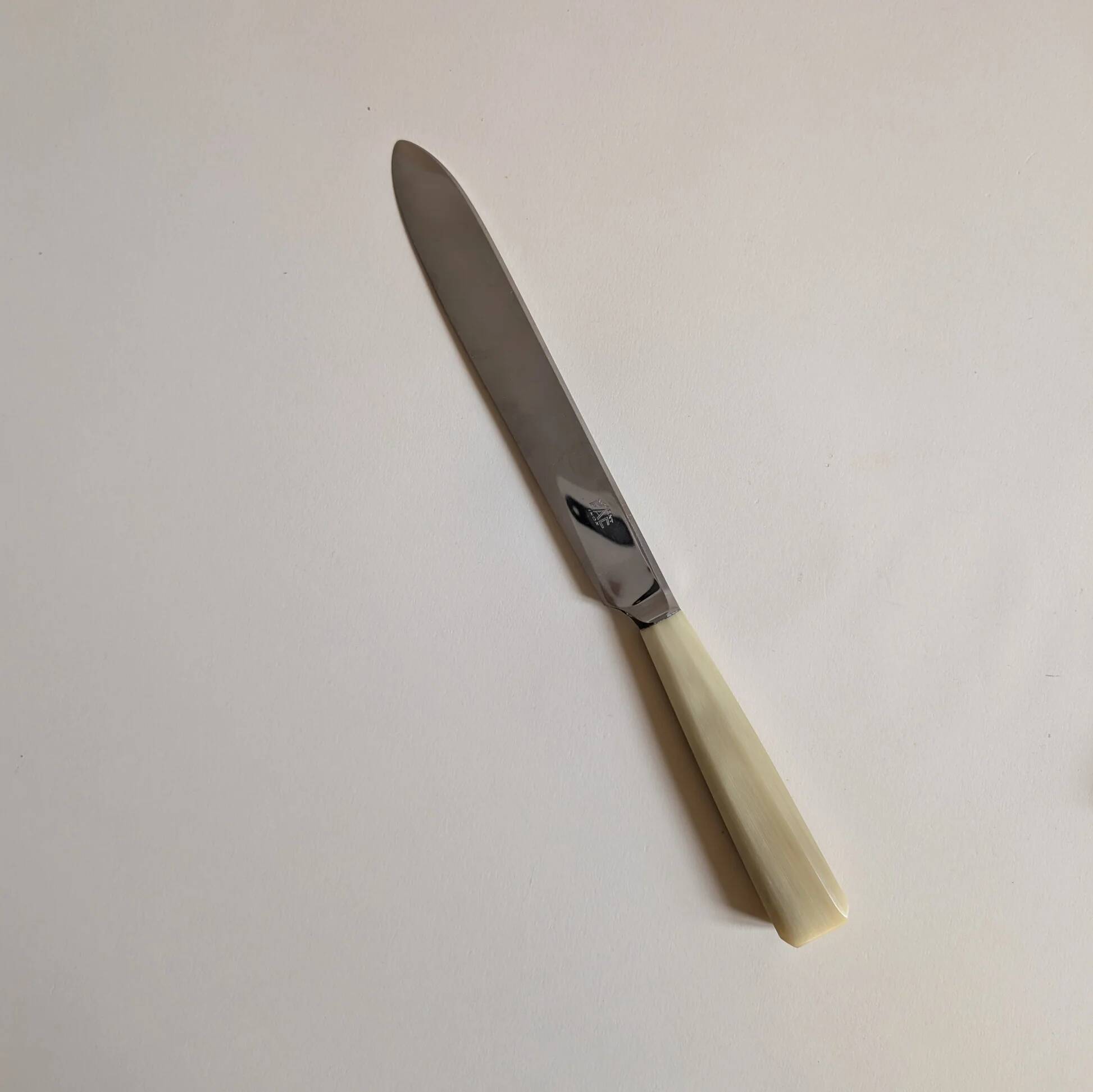 Set of 25 horn and stainless steel knives
