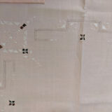 Pink embroidered and openwork tablecloth and its towels