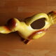 Ceramic watering can in white earthenware, yellow enamel and bird shape