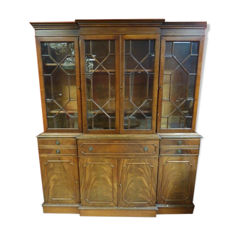 Scribanne bookcase in mahogany veneer English work of the twentieth century