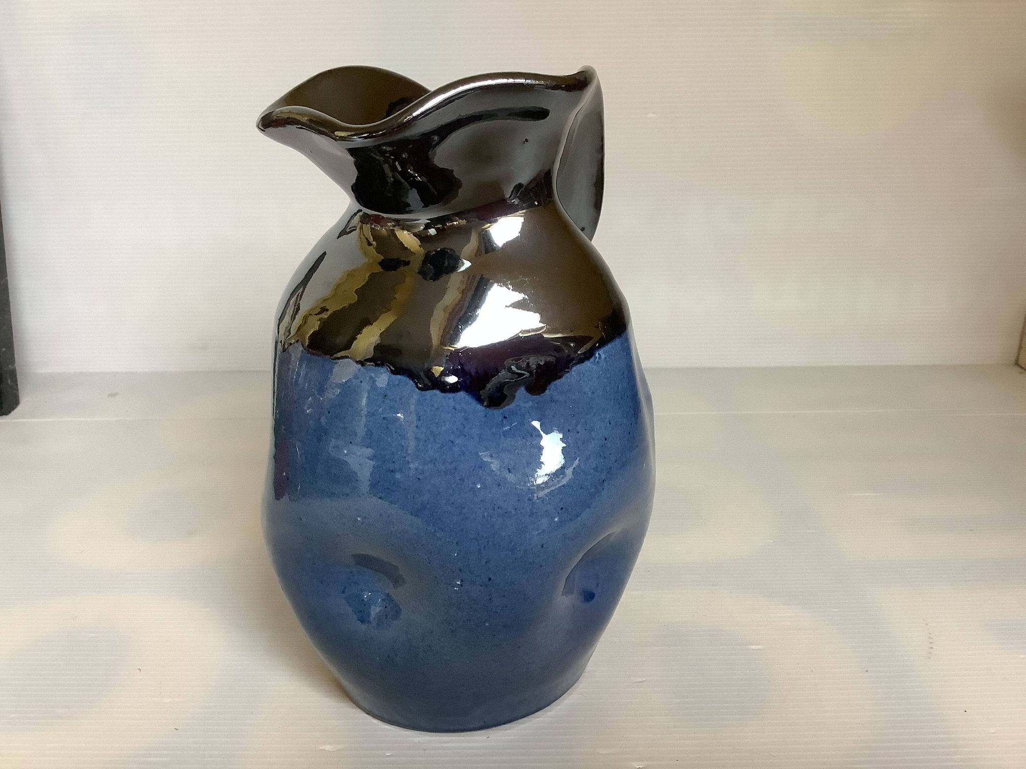 Iridescent modernist vase by Thomas Buxo