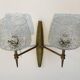 Pair of bronze wall sconces with worked glass reflectors. Stilnovo