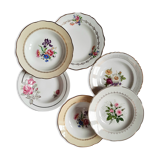 Old hollow plates mismatched in earthenware with gilded edges