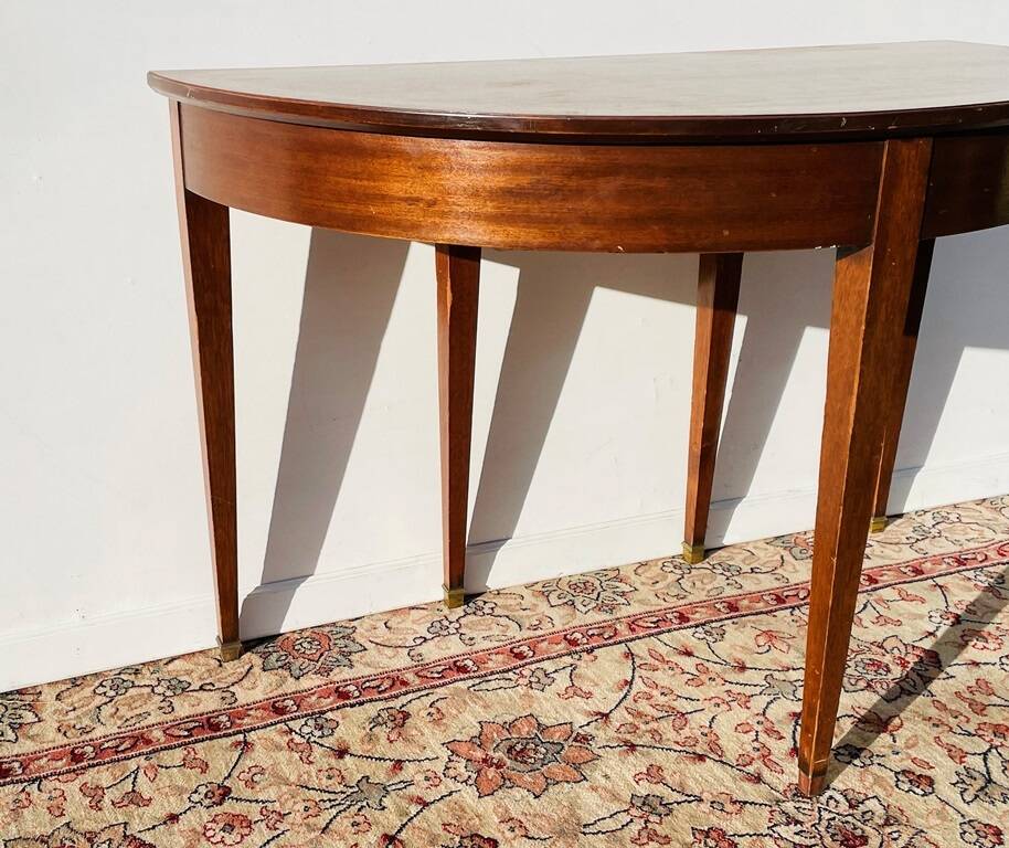 Empire-style demi-lune console from the 19th century.