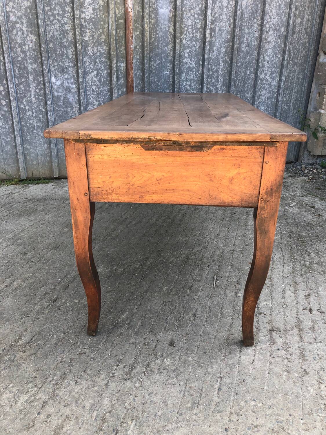 Antique solid cherry farmhouse table with 3 drawers and 2 pulls
