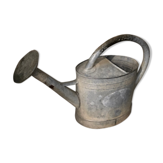 Old zinc watering can