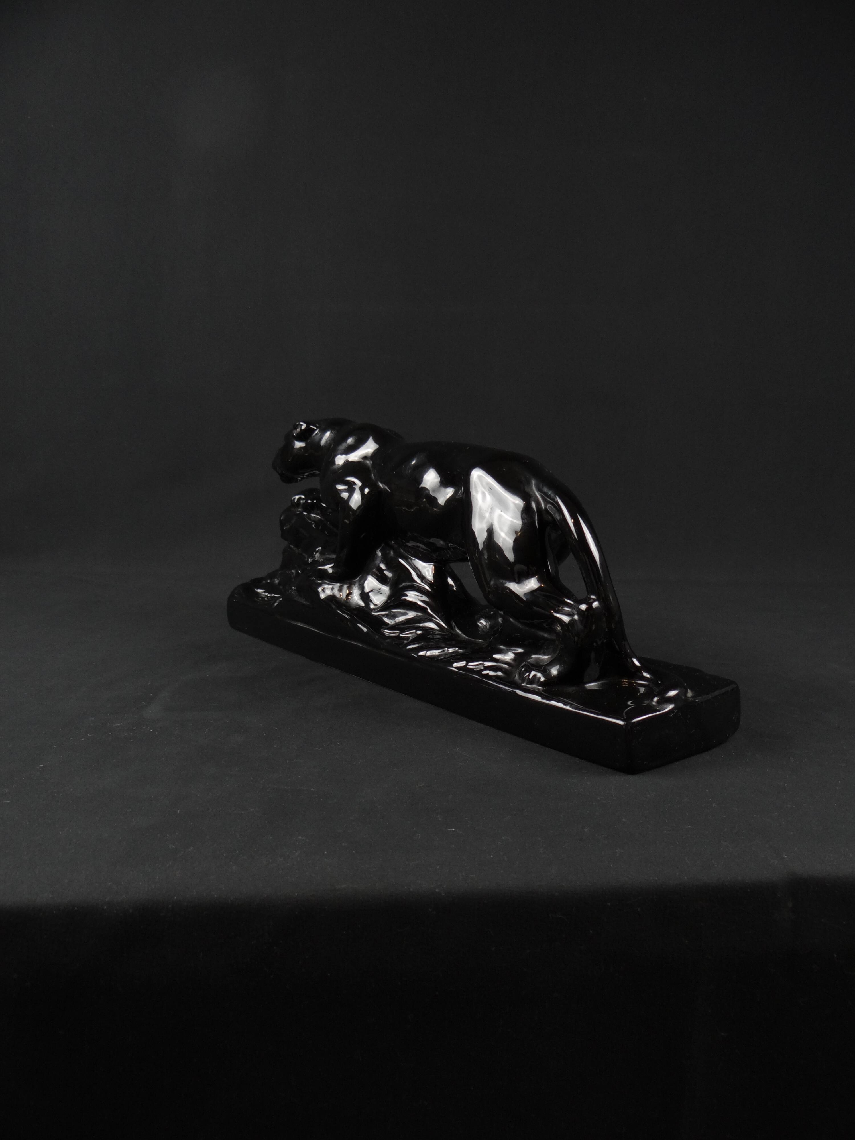 Black ceramic hunting panther from the Art Deco period, circa 1930