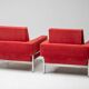 Red Kiushu armchairs by Saporiti characteristic of mid-20th century Italian modern design.