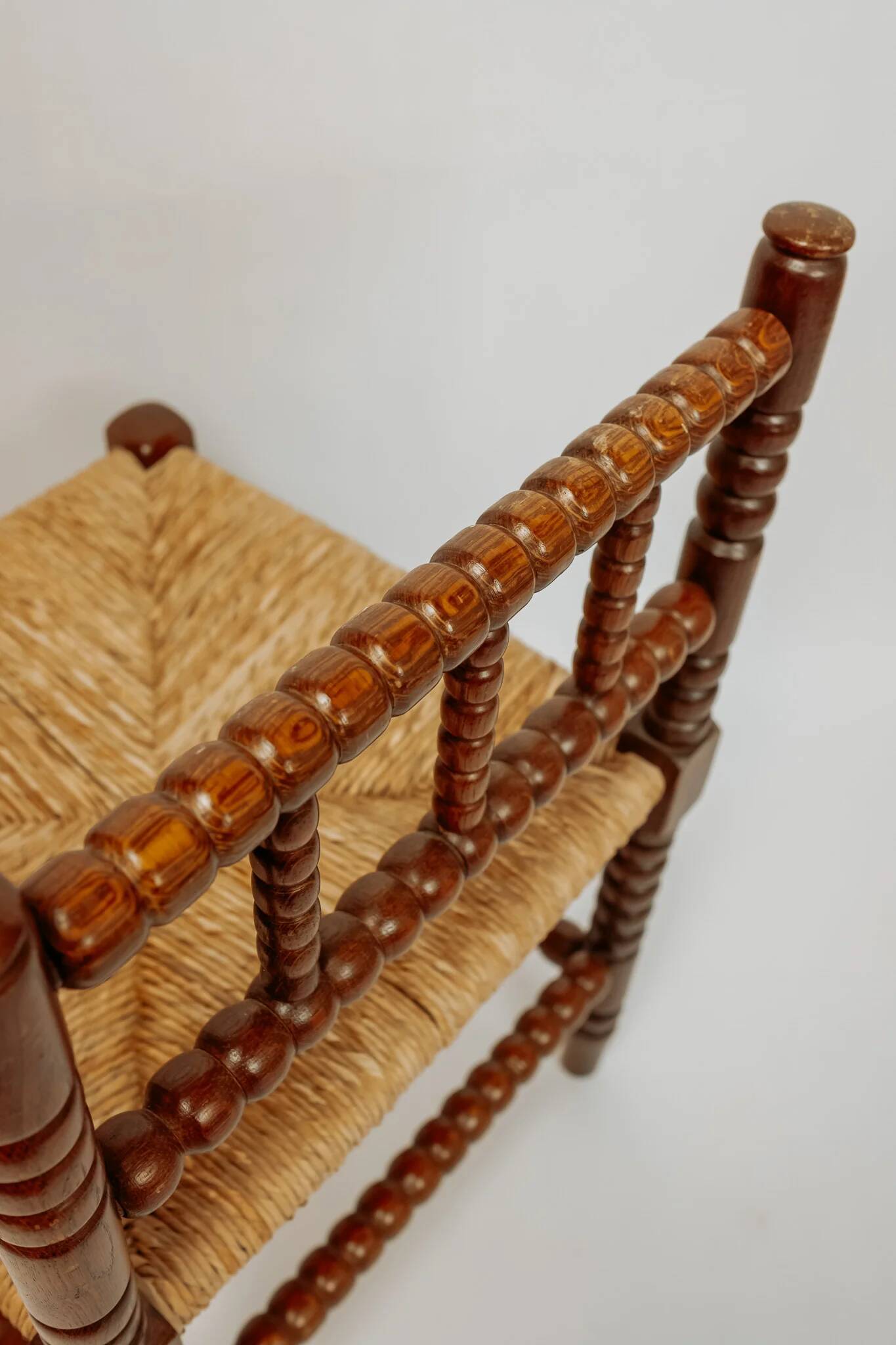 Classic vintage bobbin corner armchair