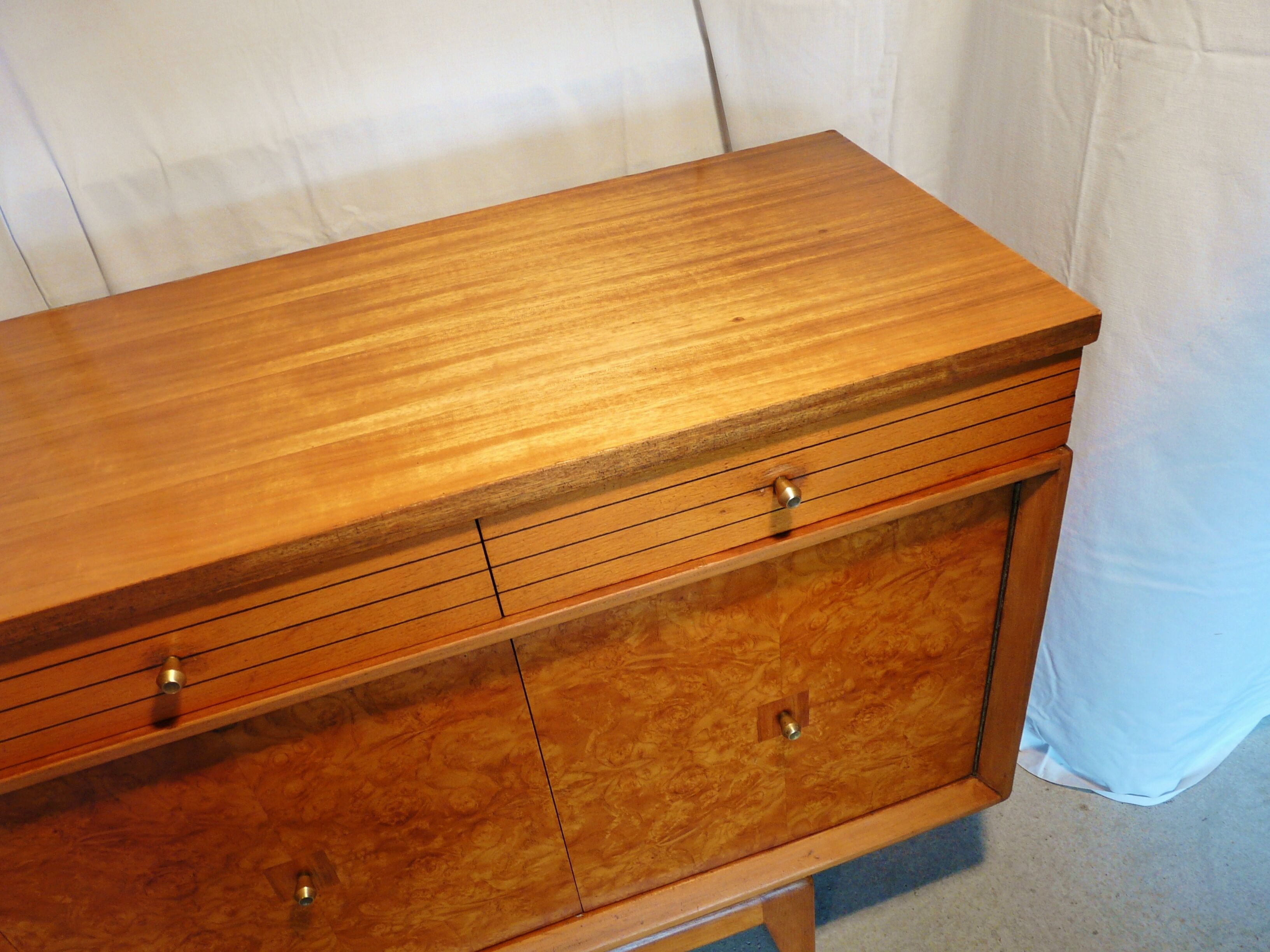 Scandinavian sideboard of blond wood and teak