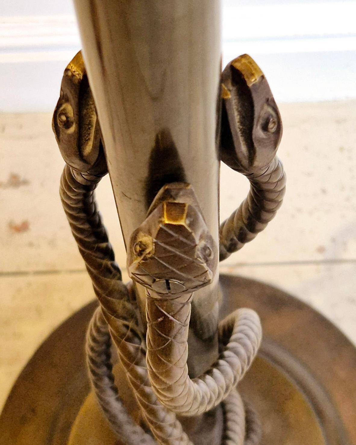 Rare and exquisite bronze floor lamp with intertwined snakes, early 1900s.