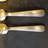 11 silver spoons with punches
