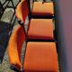 6 vintage wooden and orange fabric chairs