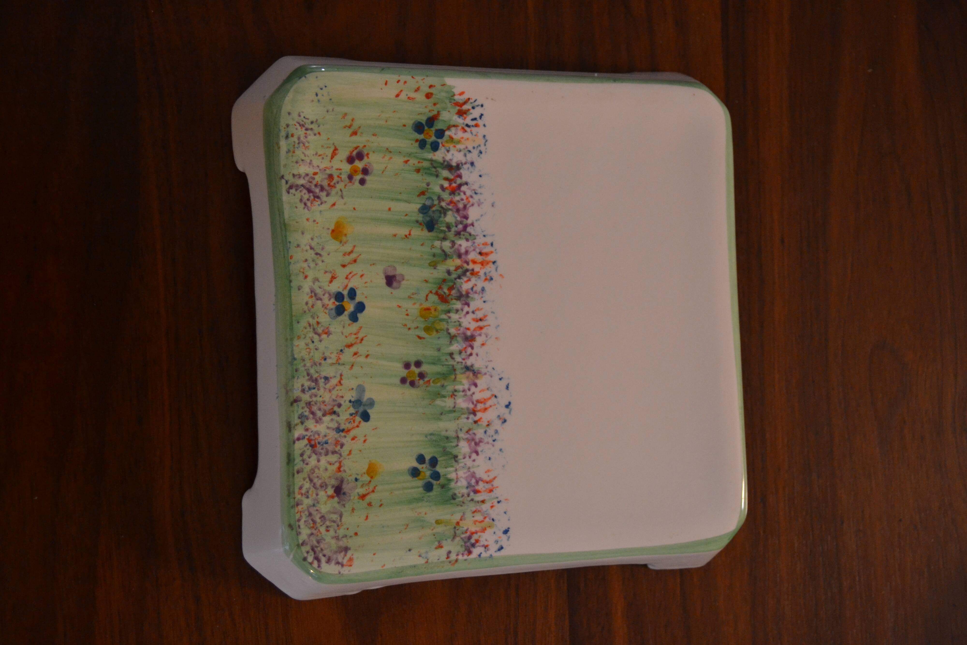 Underside of flat small flowers painted by hand