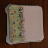 Underside of flat small flowers painted by hand