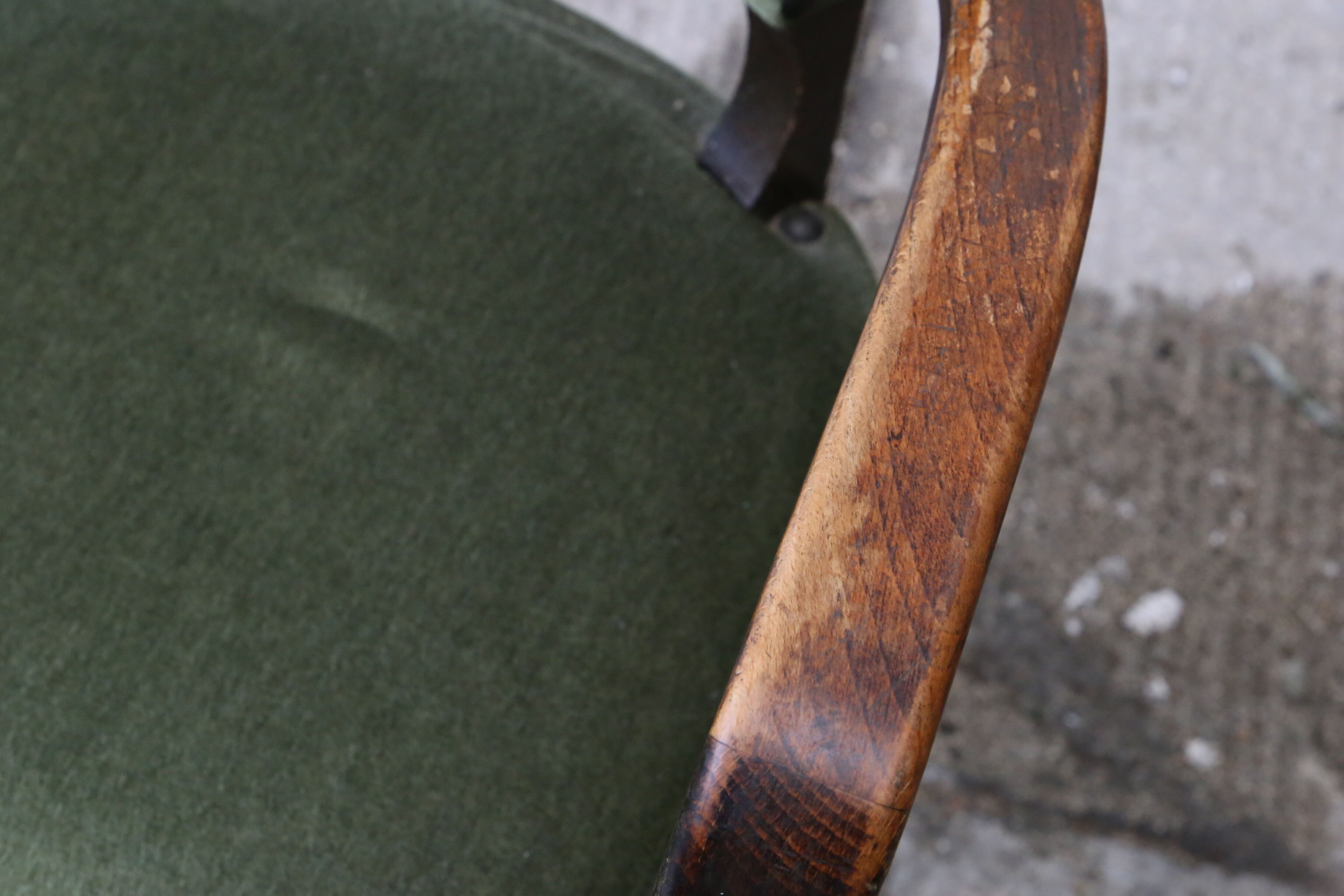Dark wood and green velvet bridge chair